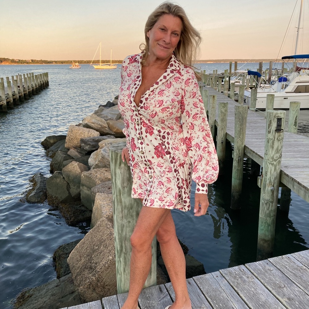 Free People dress XS pink and black on cream colored background